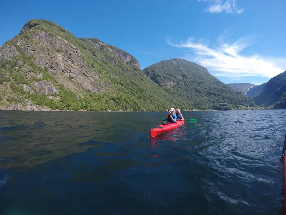 Kayaking in Mountain Fjord