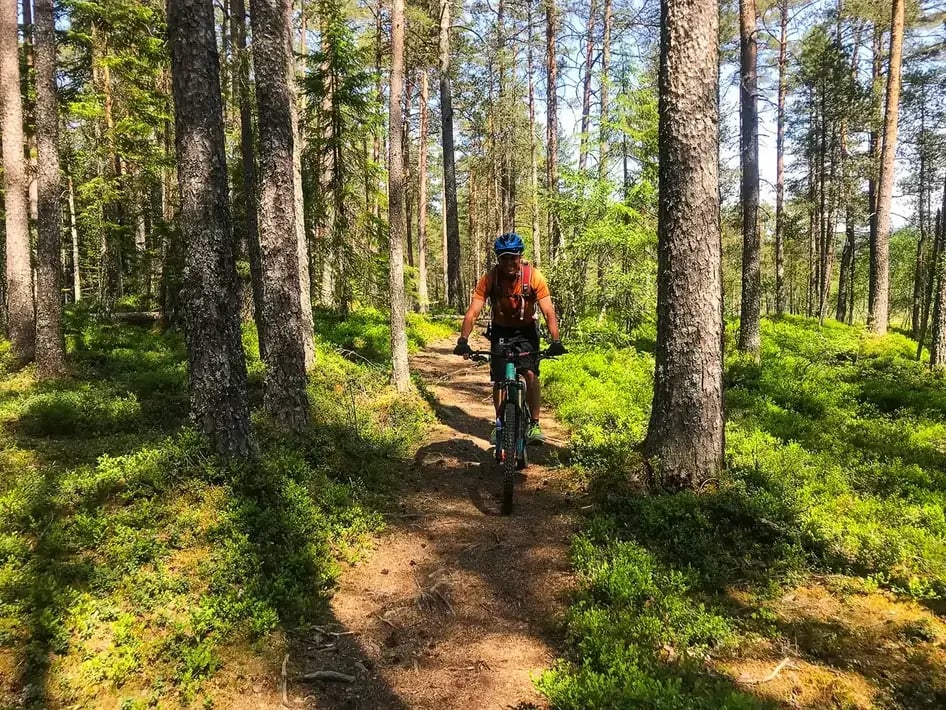 Mountain biking on a dirt trail